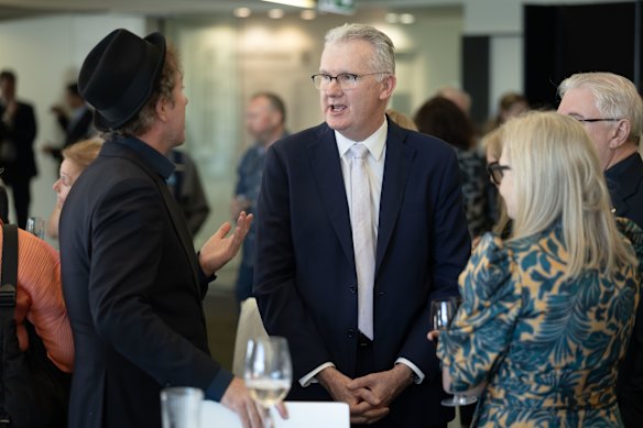Tony Burke speaks with Louis Pratt at the wake for Blanche d’Alpuget.