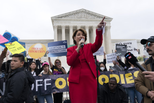 Senator Amy Klobuchar speaks outside of the US Supreme Court.