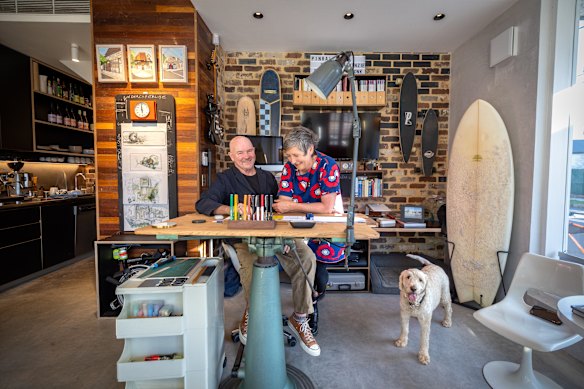 Architects Neil Mackenzie and Heidi Pronk and their groodle Milo inside the Marrickville corner terrace which they renovated with Make Projects. The group created Crossroads, a studio, an apartment and a new home that has been shortlisted for an award.