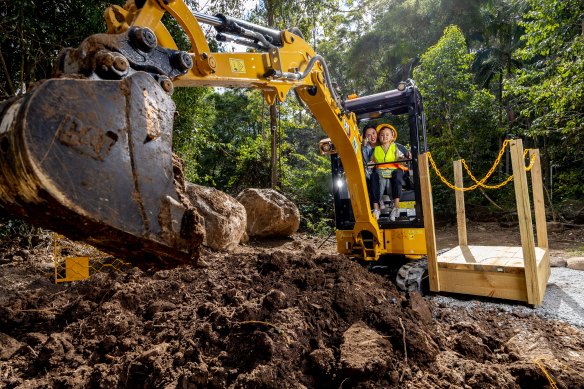 Annika Leiper and son Archer, 4,  trying out Dig It at Thunderbird Park, Mount Tamborine. 