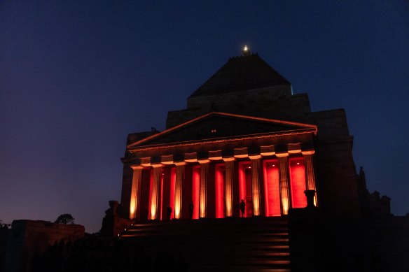 The catafalque party is illuminated at the Shrine of Remembrance during the Anzac Day dawn service.