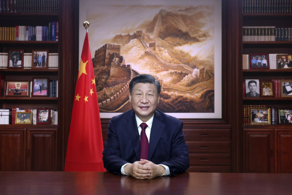 Chinese President Xi Jinping delivers a New Year address in Beijing, on Saturday, December 31.