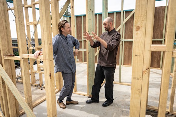 Harry Catterns (left) and Sascha Solar-March are two partners in SAHA at one of their row home design in Corrimal.