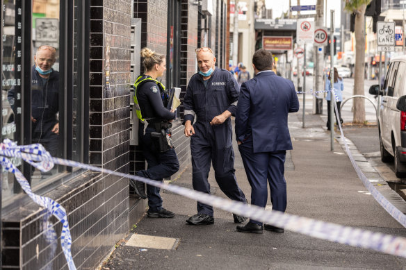 Homicide squad detectives at the scene where a woman died in Footscray.