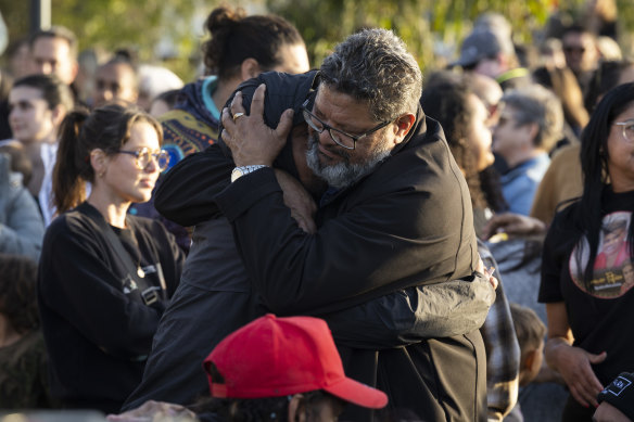 Members of the public are seen during the vigil for Cassius Turvey at Midland Oval. 