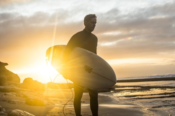 Surfer Matthew Kelly at Torquay Beach on Saturday morning