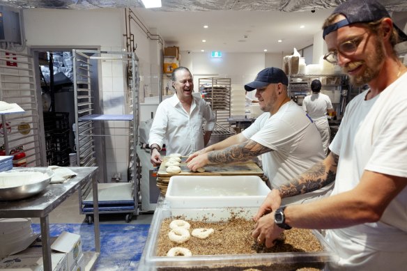 Perry chats with the team at Baker Bleu.