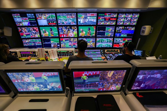 The production team operating in the broadcast truck.