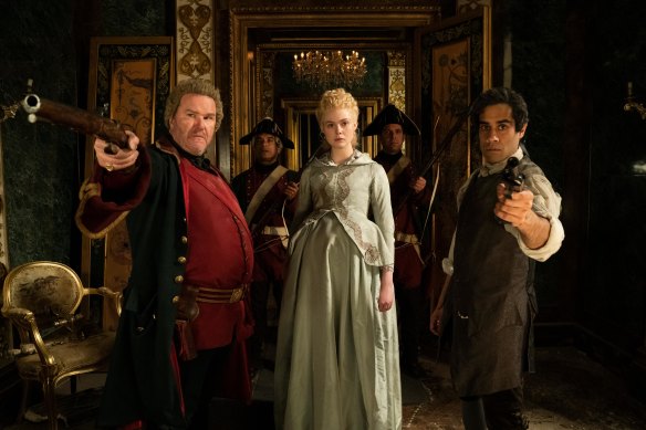 General Velementov (Douglas Hodge) and Orlo (Dhawan) help Catherine (Elle Fanning) put her husband in his place. 