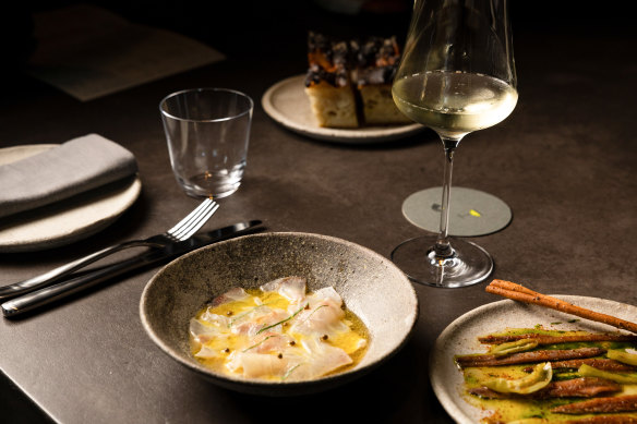 Small plates include raw snapper with Tasmanian wasabi (left) and Olasagasti anchovies with guindilla peppers.
