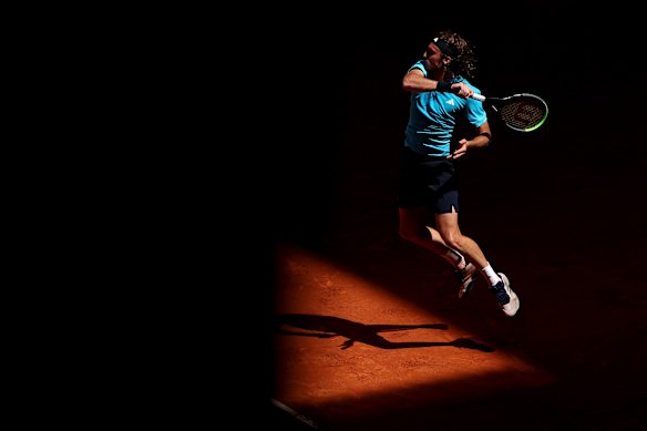 Stefanos Tsitsipas of Greece plays a forehand against Casper Ruud of Norway during the Men’s Singles Round of 16 match on Day Nine of the Mutua Madrid Open at La Caja Magica in Madrid, Spain.