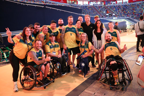 Harry and Meghan with Australia’s Invictus Games wheelchair basketball team.