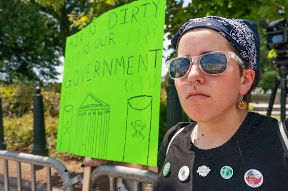 Erin Tinerella, who lives in Chicago but is in Washington DC for an internship, protests against the US Supreme Court’s decision.