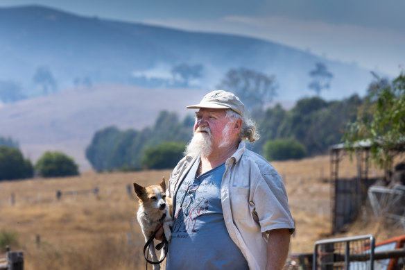 Billy Price looks out at the grass fire near Flowerdale on Wednesday.