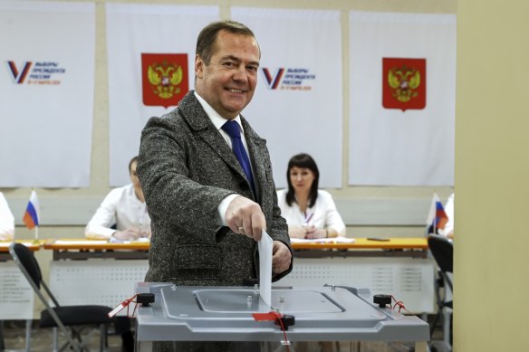 Russian Security Council deputy chairman Dmitry Medvedev, also the head of the United Russia party, casts his ballot at a polling station in Moscow.