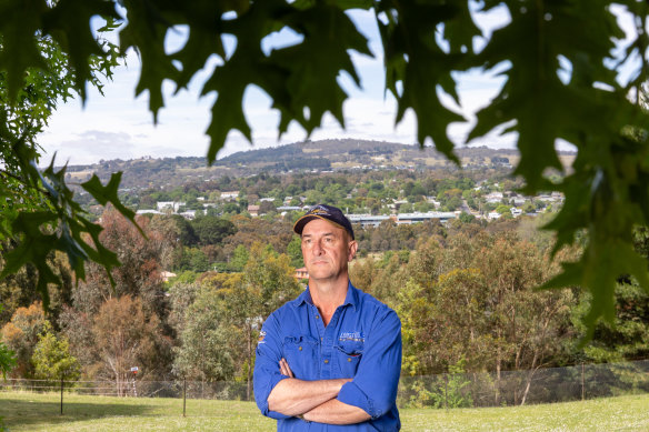 Dean Markham in the backyard of his home in Gisborne.