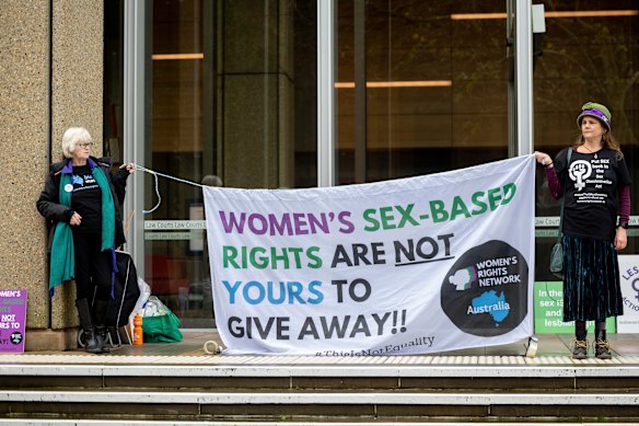 Representatives from the Lesbian Action Group and Women’s Rights Network Australia outside the Federal Court in August 2024.