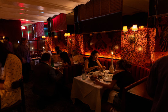 Intimate candlelit booths create a cosy atmosphere.
