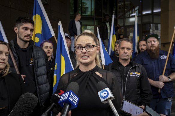 Joanna McNeill speaks on the steps of the magistrates court.