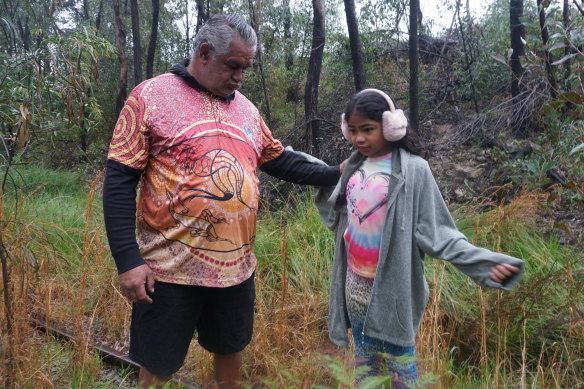 Gomeroi man Raymond Weatherall and his daughter in Pilliga Forest.