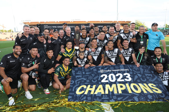 The Kiwis celebrate with the Pacific Championships trophy in Hamilton.