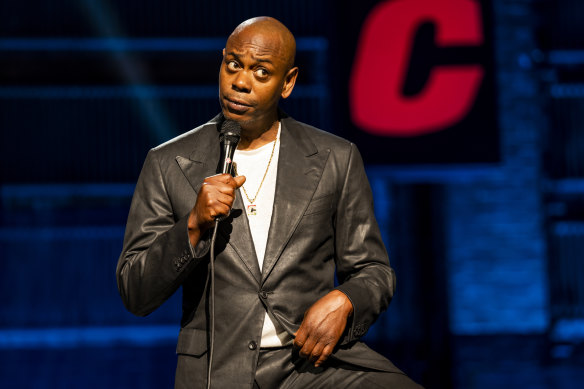 Dave Chappelle on stage performing his Netflix special, The Closer.