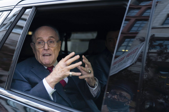 Former mayor of New York Rudy Giuliani talks to reporters as he leaves after his defamation trial in Washington last week.