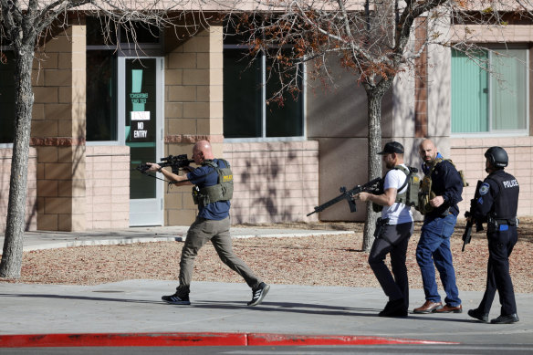 Law enforcement officers head into the University of Nevada, Las Vegas.