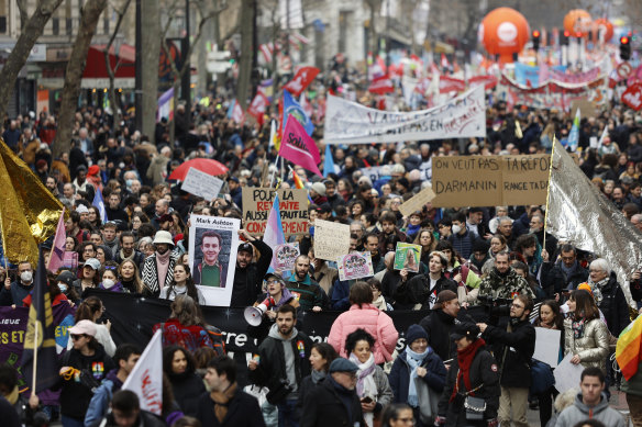 Protesters march during a demonstration against plans to push back France’s retirement age, in Paris, on Saturday, February 11.