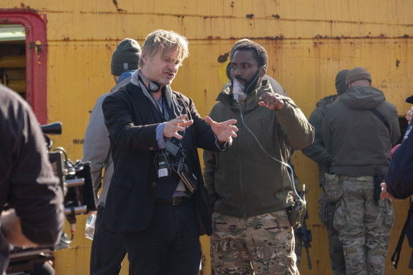 Nolan directs John David Washington on the set of Tenet.