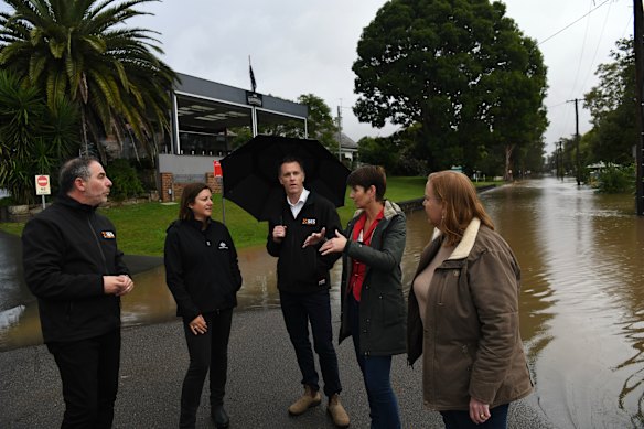 NSW Premier Chris Minns visits flood-affected Raymond Terrace on Thursday.