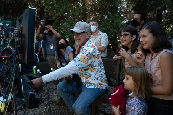 Steven Spielberg on the set of The Fabelmans with, from left, producer Kristie Macosko Krieger and actors Seth Rogen, Julia Butters, Keeley Karsten and Sophia Kopera.