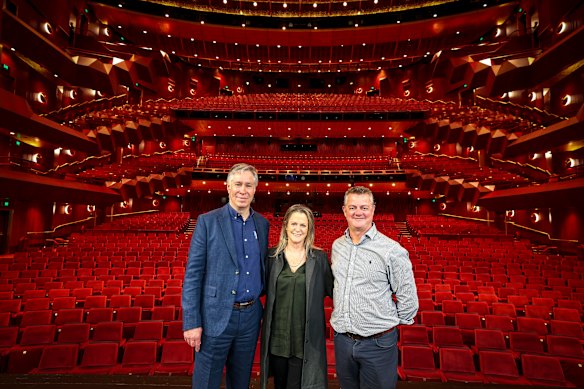 Job done: NH Architecture’s Hamish Lyon, Arts Centre Melbourne performing arts executive director Melanie Smith, and Chris King, director of the theatre “reimagining” project, in the renovated State Theatre.