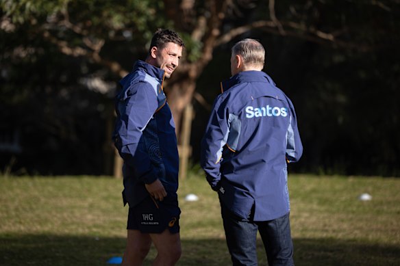 Jake Gordon and Joe Schmidt talking at a media conference last month.