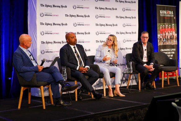 Adrian Piccoli, Henry Rajendra, Rebecca Birch and Shaun Ruming speaking on a workforce issue panel. 