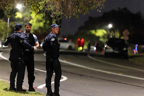 Police close a street in Bonnyrigg following a mass shooting in Bondi. Authorities said the police action was linked to the attack.