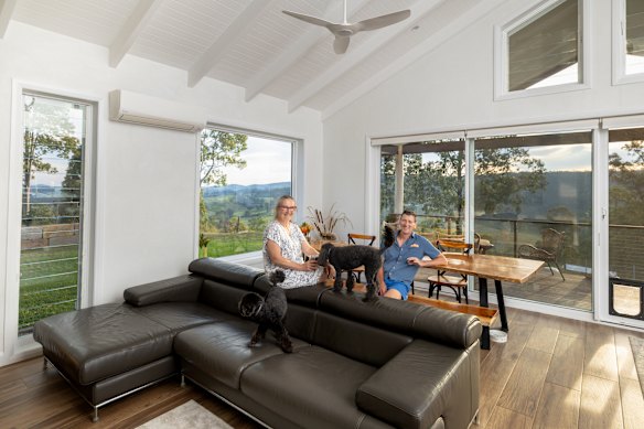 Graham and Bridgit, with their dogs Jet and Tiara, can enjoy a home that is comfortable throughout the seasons.