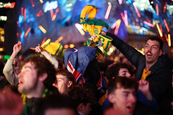 Fans celebrate Australia’s first goal.