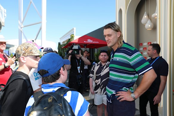 Collingwood footballer Darcy Moore chatting to fans at the Emirates event on Tuesday.