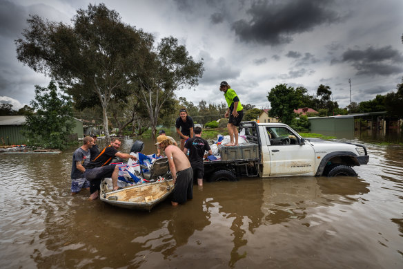 Residents transport sandbags in Echuca, on the Murray River.