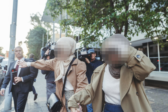 Family members of one of the juveniles outside the Parramatta Children’s Court.