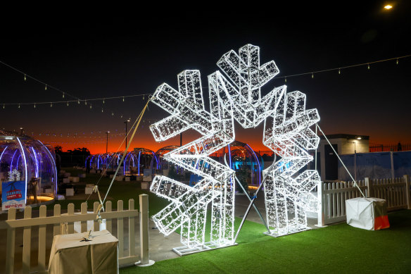 A giant snowflake adds to the wintry theme.