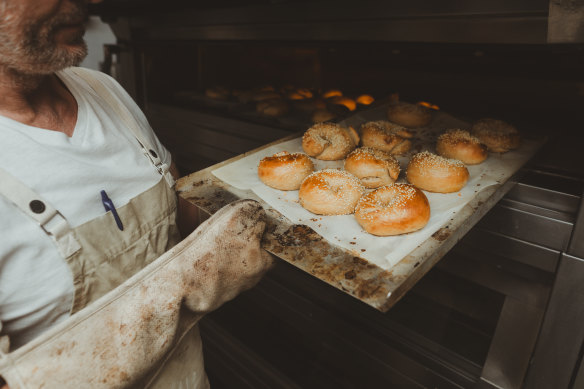 Preparing bagels. 