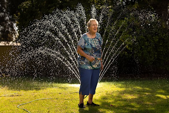 Moyne Hahnel, 93, put on her sprinkler to save her garden in the record-nudging heat.
