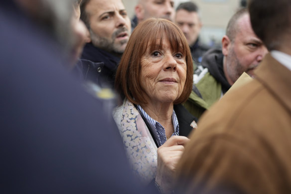Gisele Pelicot exits the Avignon courthouse, in southern France, after all the men accused along with her husband of raping her were found guilty.