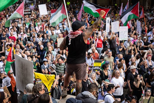 Palestine Action Group members and supporters protest in Sydney on Monday against Israeli President Isaac Herzog’s visit to Australia.