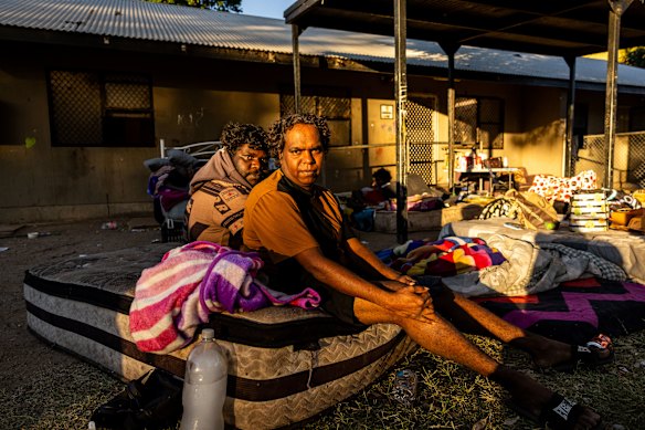 Family members of missing five-year-old Sharon Granites, Ian Darkie and wife Nicole, wait at her house at the Old Timers Camp.