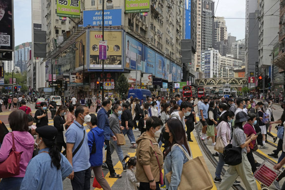 Hong Kong’s crowded streets, Tuesday, May 3, are in stark contrast to Shanghai’s lockdown.