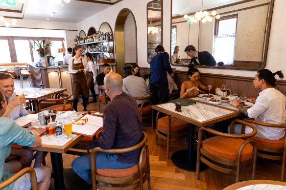 Charlotte’s wood-panelled and linen-draped dining room.