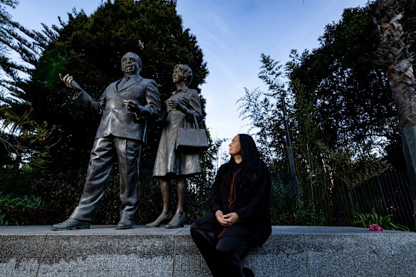 Ngarra Murray, pictured beneath the statue of her great-grandparents Sir Doug and Lady Gladys Nicholls, is dismayed by the push to repeal Victoria’s treaty laws. 